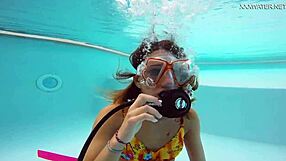 Katya Nakolkina is a beautiful brunette and she swims in the sea.
