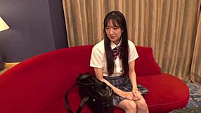Young Asian girl J gets paid 100,000 yen for her first sexual experience in Hardcore video.