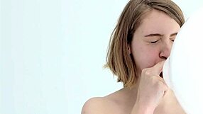 Young Babe Blows And Pops Her First Balloon!