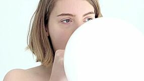 Young Babe Blows And Pops Her First Balloon!