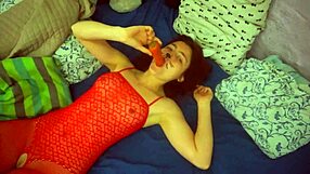 Beautiful woman with natural breasts and big ass enjoys while her men pleasure her with a carrot.