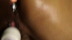 Ebony lesbians finger, spank, and fuck asses