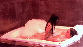 In the jacuzzi, her natural big tits bounce as she rides and moans
