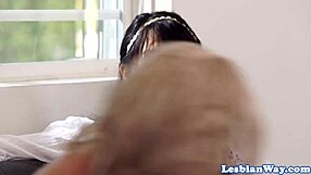 Beautiful woman enjoys lesbian fingering