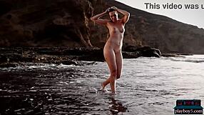 Old European MILF undressing solo on the beach