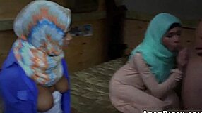 Young Middle Eastern woman in hijab getting her pussy probed by military personnel