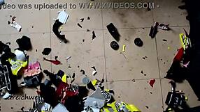 Colombian guy crushes racing cars with boots in garage.