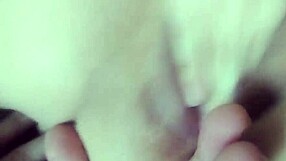 Gently exploring the little bottom with curious fingers