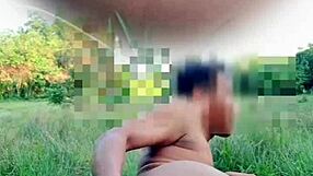 Myanmar twink engages in naked outdoor solo anal play with zoom