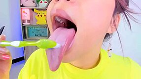 lila jordan brushes her teeth on webcam, showing saliva and tongue in tall fetish style