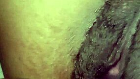 Hey, she's playing with her pussy and big black cock close up!