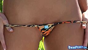 I, Randy Moore, am playin in my bikini outdoos, showin my tits.