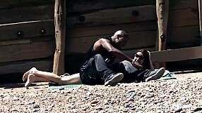Amateur teen gets caught cheating and punished by a big black cock on the beach