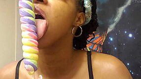 Ebony babe samples unicorn lollipop with sucking fetish