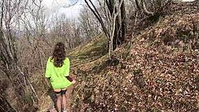 Hot brunette gets naked and touches herself outdoors