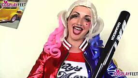 Harley Quinn in black pantyhose gives a footjob