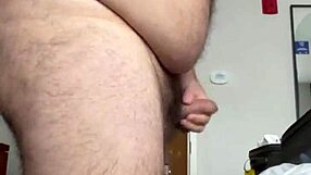 Watch This Horny Gay Guy Masturbating His Hairy Belly And Boobs!
