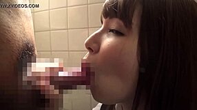 Japanese beauty sucks and rides in steamy action.