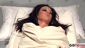 Brett Rockman and Sascha Taylor Rain in a straight jacket scene