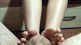 Does This Asian Milf Use Her Sexy Legs and Feet to Satisfy a Big Cock?