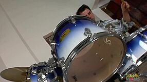 Blonde beauty gives blow job and has sex with drummer