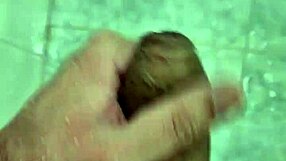 Well-endowed twink plays suggestively in the shower