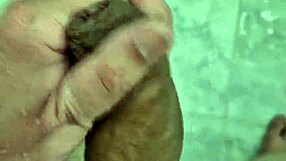 Well-endowed twink plays suggestively in the shower