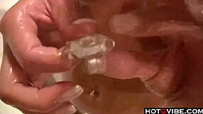 i'm in the bathtub watchin this hot brunette masturabte with toys