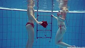 I’m captivated by Marusia and Melisa Darkova’s underwater lesbian play