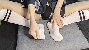 Skinny gay boy's feet and big cock in action