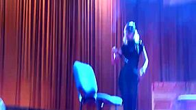 Skinny blonde gives a sexy lap dance on the public stage
