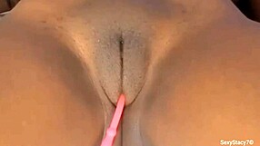 Stacy7 enjoys playing with her big clit and vagina
