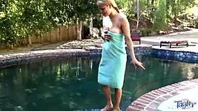 blonde teen teasing herself with dildo in pool, close up fingering