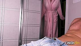 Milf in hair rollers gives quick morning wood handjob to finish