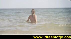 On the beach, a gay guy surfs up while fingering himself in softcore solo action