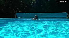 Beautiful Hungarian woman Angelica enjoys outdoor swimming in her bikini