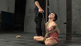 Gagged Slut Receives Whipping On Tits While Gagging On Cock