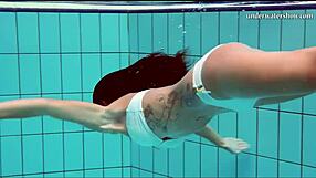 Nata is a hot Hungarian woman who likes to swim in the pool