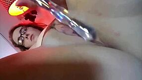 nude femdom engages in a solo masturbation session with sexting