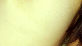 Cute brunette poses on sofa during photoshoot, revealing petite body for casting