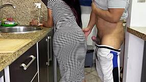 Sexy stepdaughter cleans the kitchen in a tight dress