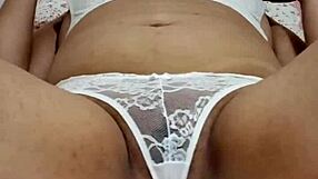 Pretty Young Girl In Lingerie Sensually Teasing Her Pussy And Tits