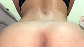 Look at that curly hottie shifting her panties to ride the console!