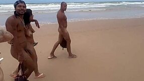 Nudist beach party with hot friends and camera in hand