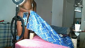 Solo sexy African American MILF with saggy tits.