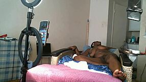 Solo sexy African American MILF with saggy tits.