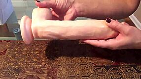 Big 12-inch silicone dildo pleasures indian lesbian's fake tits