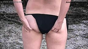 Blonde teen strips out of bikini for public beach flashing