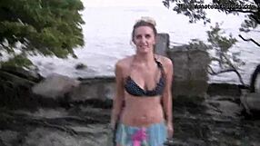 Blonde teen strips out of bikini for public beach flashing