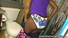 Pretty Ebony Girl Dresses in Bathroom with Sexy Thighs